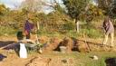 strawberry beds in the making, by daughter Suzanne and Bry